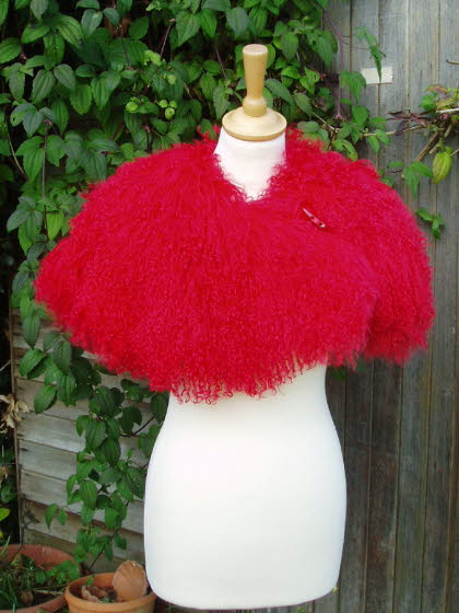 Red Mongolian Sheepskin Shrug Fastened with a Toggle