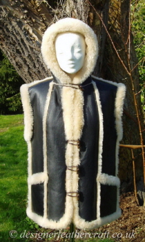 The Hood on the Gilet also Fastens at the Neck